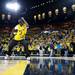Michigan fan and eight-year-old Robert Davis Jr. dances on the court of Crisler Arena during an intermission on Monday, April 8. Daniel Brenner I AnnArbor.com